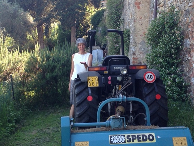 Author Lynn Rodolico with her tractor at Villa Arrigo. Photo by Trisha Thomas