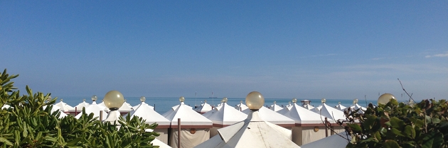 Tents for bathers line the beach on the Lido, Venice. August 26, 2013. Photo by Trisha Thomas