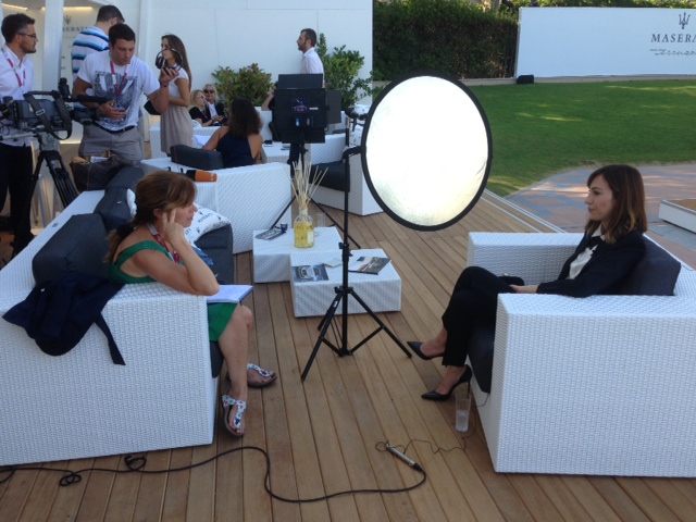 Trisha Thomas interviewing Gia Coppola for Associated Press Television at the Venice Film Festival. September 1, 2013. Photo by AP Cameraman Paolo Lucariello