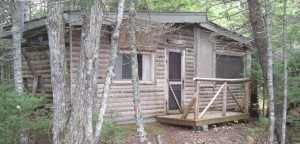 Log Cabin built by Henry Slayter in 1970 on Bog Lake in Down East Maine