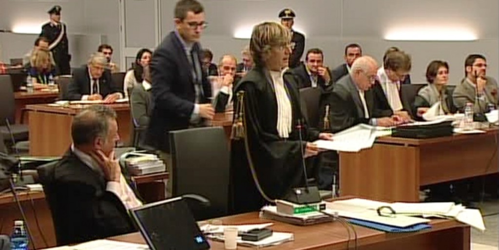 Giulia Bongiorno, defense lawyer for Raffaele Sollecito speaking in courtroom in Florence at opening of Meredith Kercher murder re-trial. September 30, 2013. Freeze Frame of RAI Pool video. 