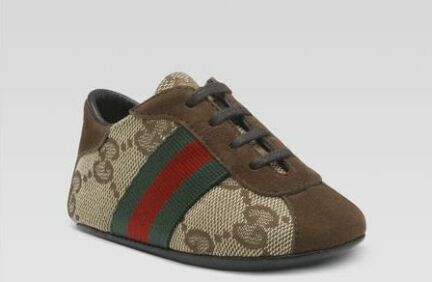 Gucci Baby Shoes with typical Italian lace-tying. Credit: Gucci