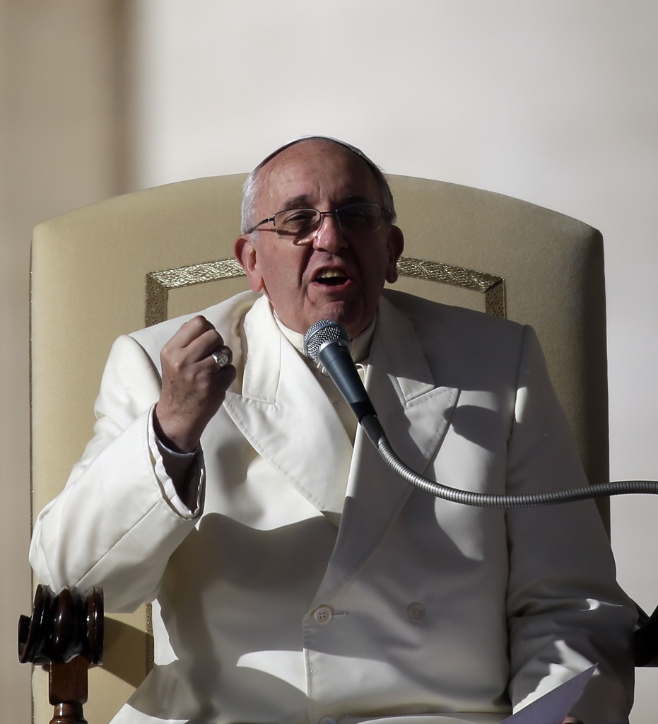 Pope Francis speaks to faithful during his weekly audience in St. Peter's Square. December 4, 2013. Photo by AP Photographer Gregorio Borgia