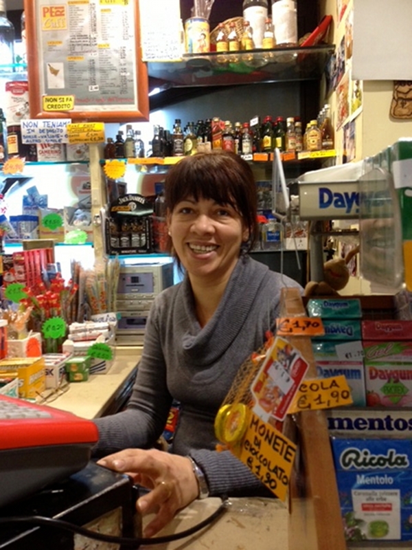 Isa from Cuba at her position behind the cash register at the coffee bar at Piazza Flaminio, Rome. Photo by Trisha Thomas February 2014