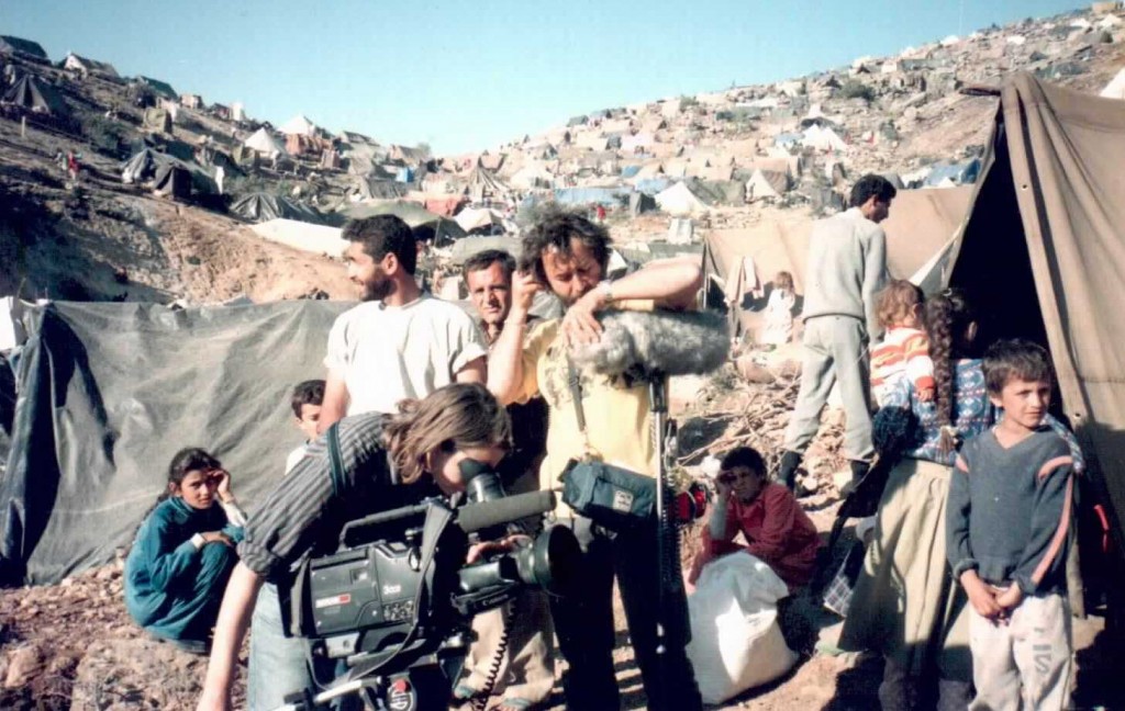 Camerawoman Jane Hartney filming in Kurdistan in 1992 with her soundman Diego Grimaldi.