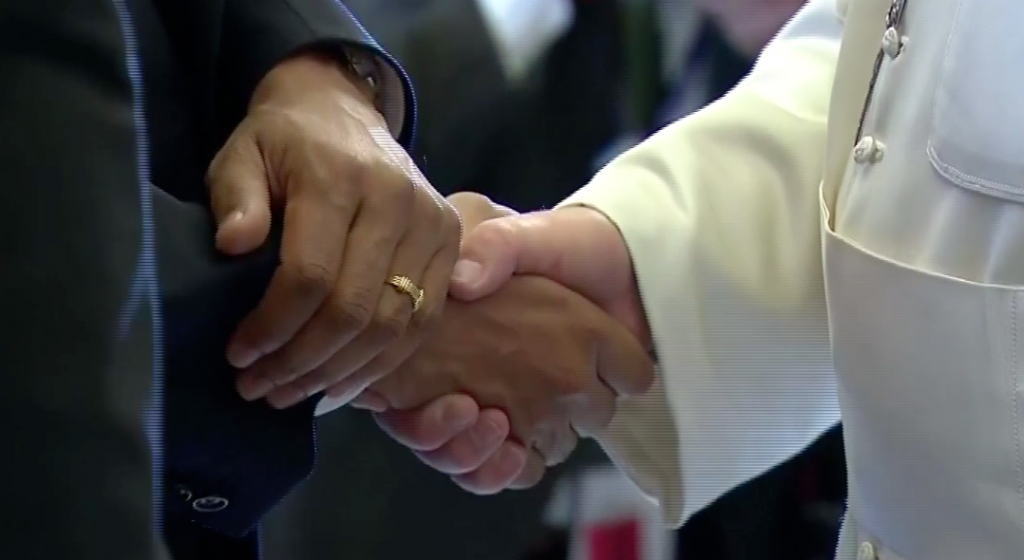 Pope Francis and President Obama shake hands at the end of their meeting at the Vatican. March 27, 2014. Freeze Frame of Vatican TV footage.