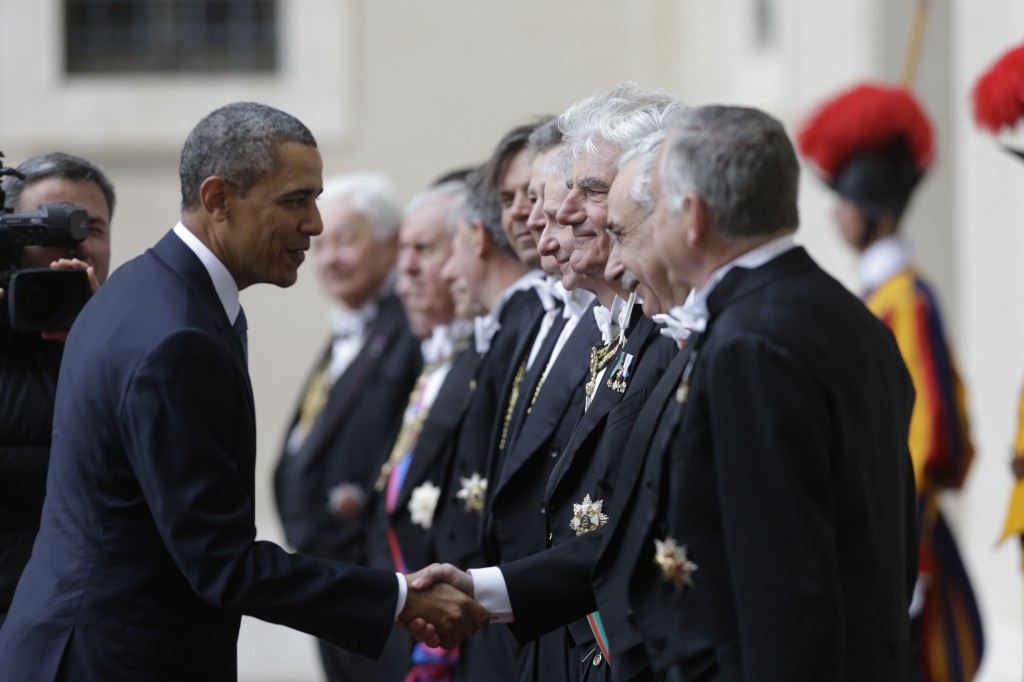 President Obama greeting the Papal Gentlemen on his arrival at the Vatican. March 27, 2014. Photo by AP Photographer Alessandra Tarantino for Mozzarella Mamma