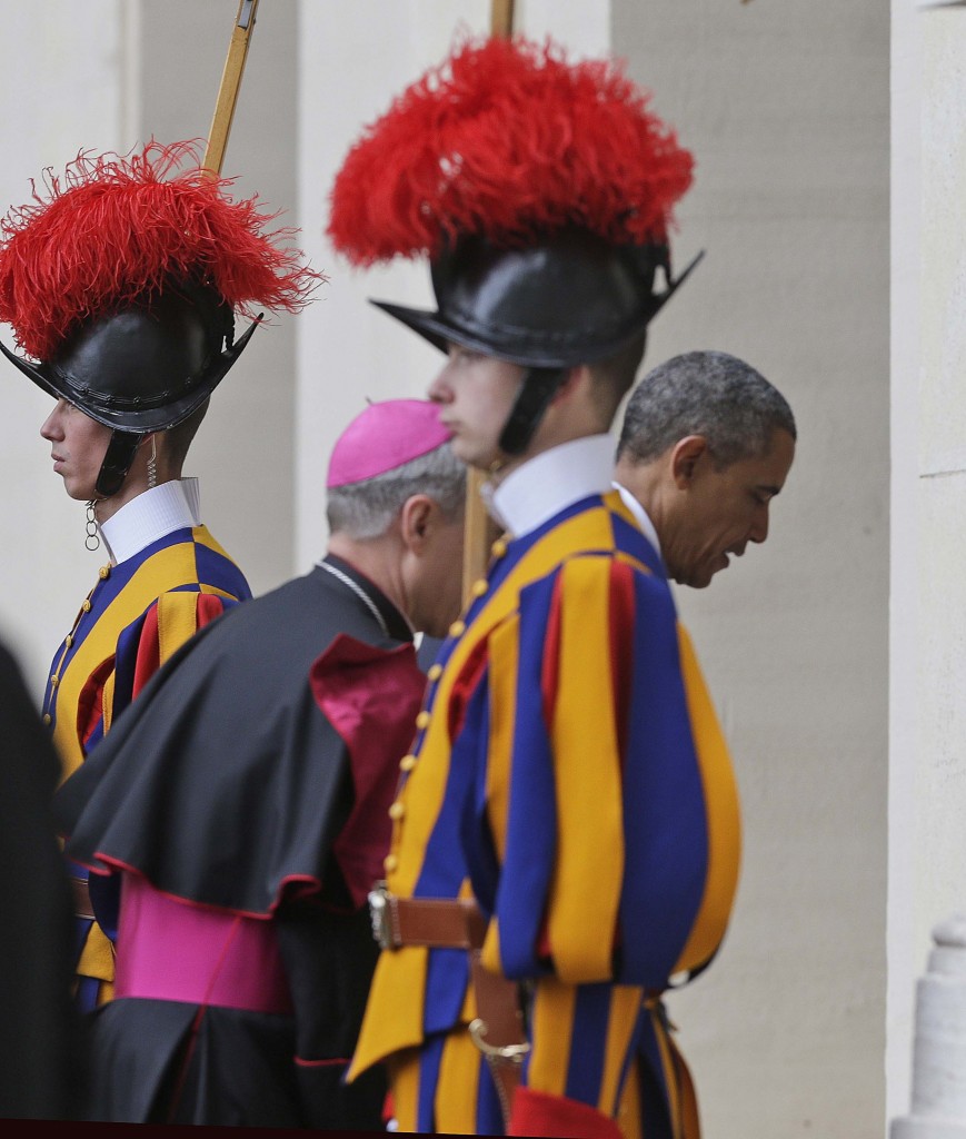 President Obama steps past the Swiss Guards as he enters the Vatican. March 27, 2014. Photo by AP Photographer Alessandra Tarantino for Mozzarella Mamma