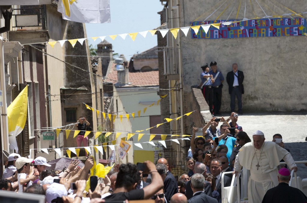 Pope Francis getting into popemobile in Cassano allo Jonio, in Calabria. Saturday, June 21, 2014. Photo for Mozzarella Mamma by AP Photographer Alessandra Tarantino