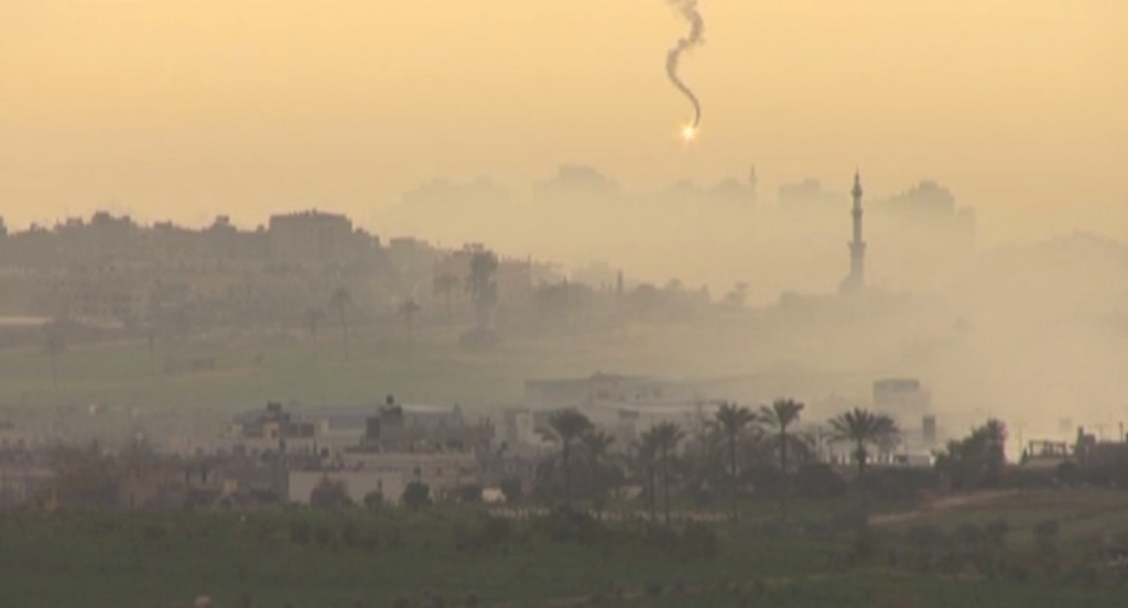 Freeze frame of video shot by Simone Camilli of an Israeli bomb falling on Gaza.
