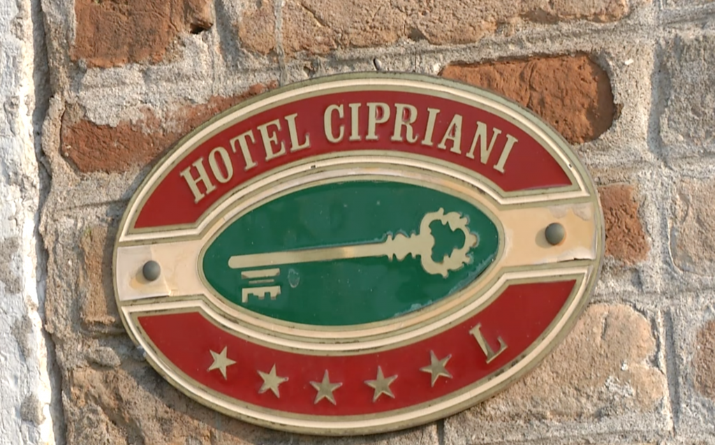 A sign on the Hotel Cipriani where George Clooney and his guests are expected to stay. Freeze frame of video shot by AP Television video-journalist Pietro De Cristofaro. September 25, 2014
