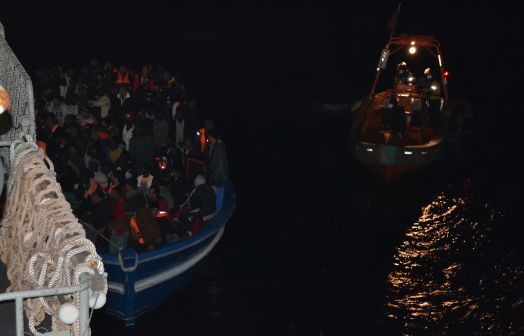 Migrants' ship next to Portuguese Vessel Viana Do Castelo. Friday, November 14, 2014. Credit: Portuguese Navy