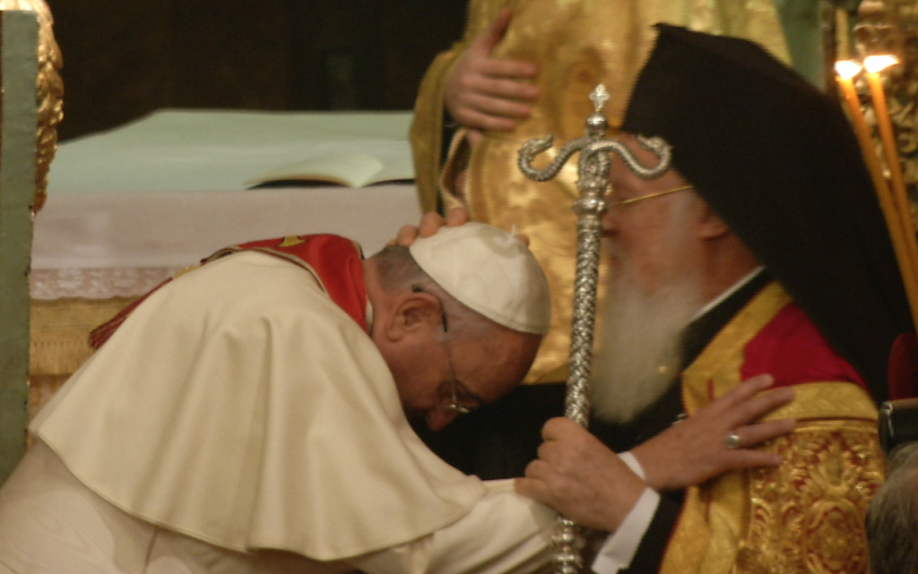 Pope bends his head and asks for a blessing from Patriarch Bartholomew I at the Orthodox Church of St. George in Istanbul. November 29, 2014.  Photo for Mozzarella Mamma by AP Photographer Gregorio Borgia.