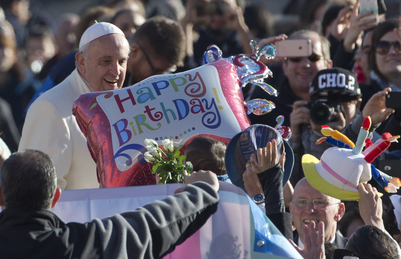 Pope Francis at his weekly audience in St. Peter's Square at the Vatican, Wednesday, Dec. 17, 2014. Photo by AP Photographer Alessandra Tarantino for Mozzarella Mamma