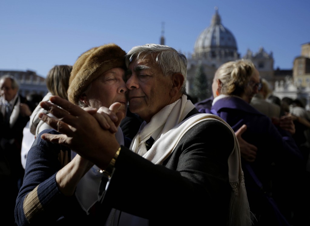 A couple dancing the tango cheek-to-cheek at the Vatican to celebrate Pope Francis' 78th birthday. Photo by AP photographer Gregorio Borgia for Mozzarella Mamma. December 17, 2014