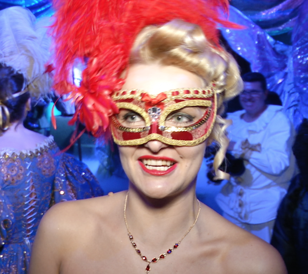 Anna Mikhail from St. Petersburg talking to AP during Il Ballo del Doge. February 7, 2015. Freeze frame of video shot by AP Television Cameraman Gigi Navarra.