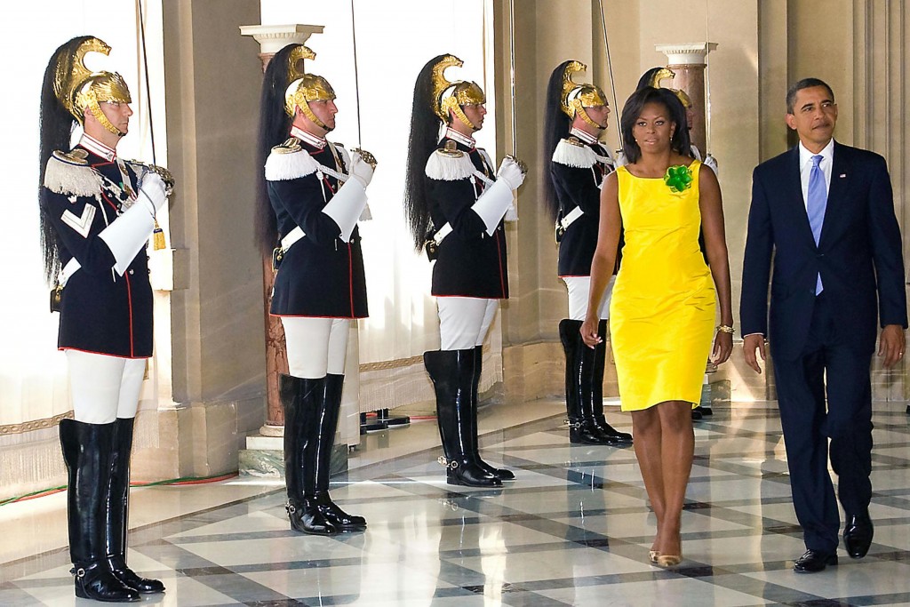 First Lady Michelle Obama and President Obama walk past the Corrazziere honor guard at the Quirinale Palace in Rome during a visit to President Giorgio Napolitano. Rome, July 8, 2009. Photo provided by Quirinale