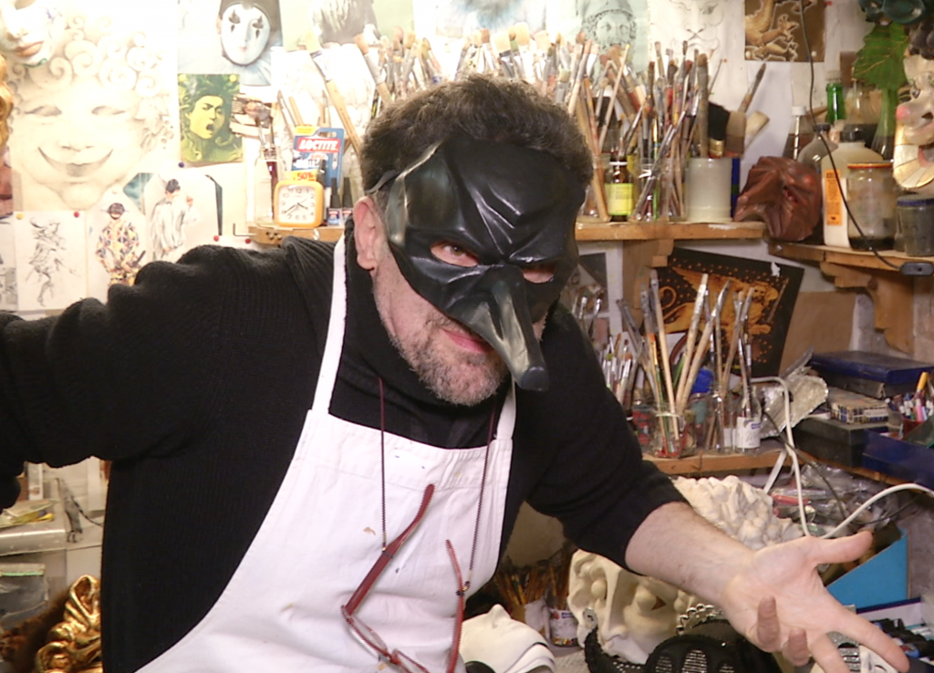Master Mask Maker Gualtiero Dall'Osto demonstrating the character behind the Commedia Dell'Arte mask for one of the "Zanni" at his workshop in Venice. February 9, 2015. Freeze frame of video shot by AP Television Cameraman Gigi Navarra.