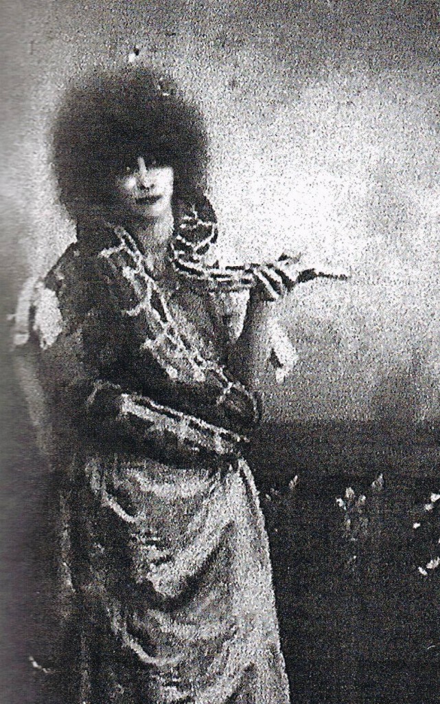 Louisa Casati with one of her pet snakes at a Beaumont Ball, Paris, photographer unknown, ca.1920's