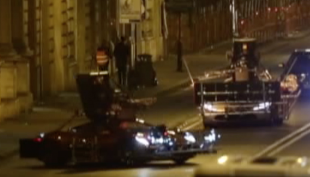 Cars rigged up for filming a car chase scene on Corso Vittorio Emanuale II in the center of Rome.  February 24, 2015