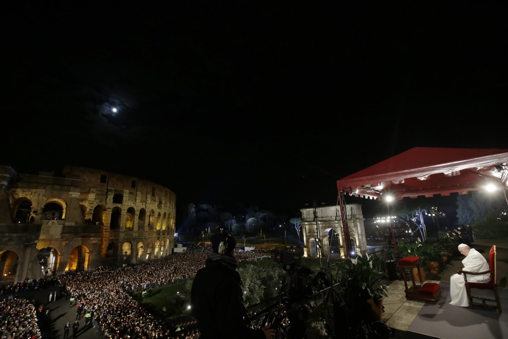 Pope Francis takes part in the Via Crucis (Way of the Cross) at the Colosseum on Good Friday, April 3, 2015. Photo by AP Photographer Gregorio Borgia for Mozzarella Mamma