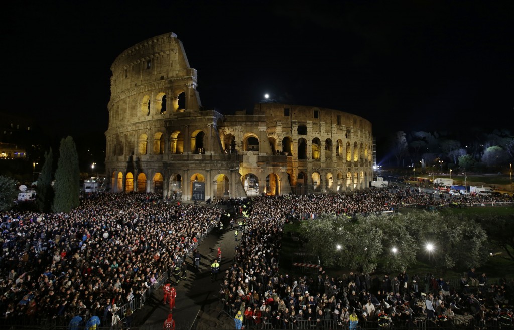 With a full moon overhead, a crowd of faithful packed around the Colosseum in Rome waiting for Pope Francis and the Via Crucis (Way of the Cross) ceremony. April 3, 2015. Photo by AP Photographer Gregorio Borgia for Mozzarella Mamma