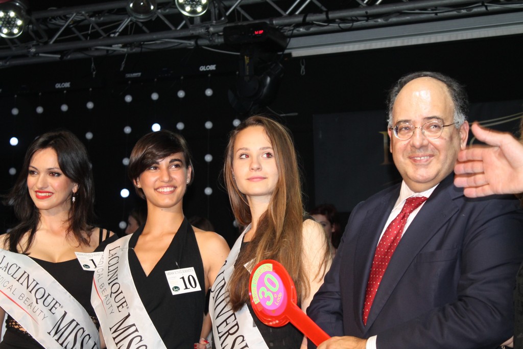 Eugenio Gaudio, President of the University of Rome Sapienza with the three top finalist in the Miss University competition. May 6, 2015