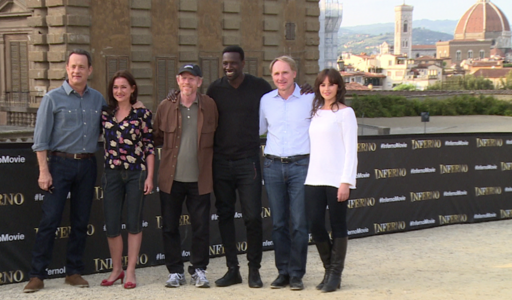 Tom Hanks, Sidse Babett Knudsen, Ron Howard, Omar Sy, Dan Brown and Felicity Jones during photo-opportunity in Boboli Gardens during filming of "Inferno" - Freeze frame of video shot by Columbia Pictures.  Florence, May 11, 2015