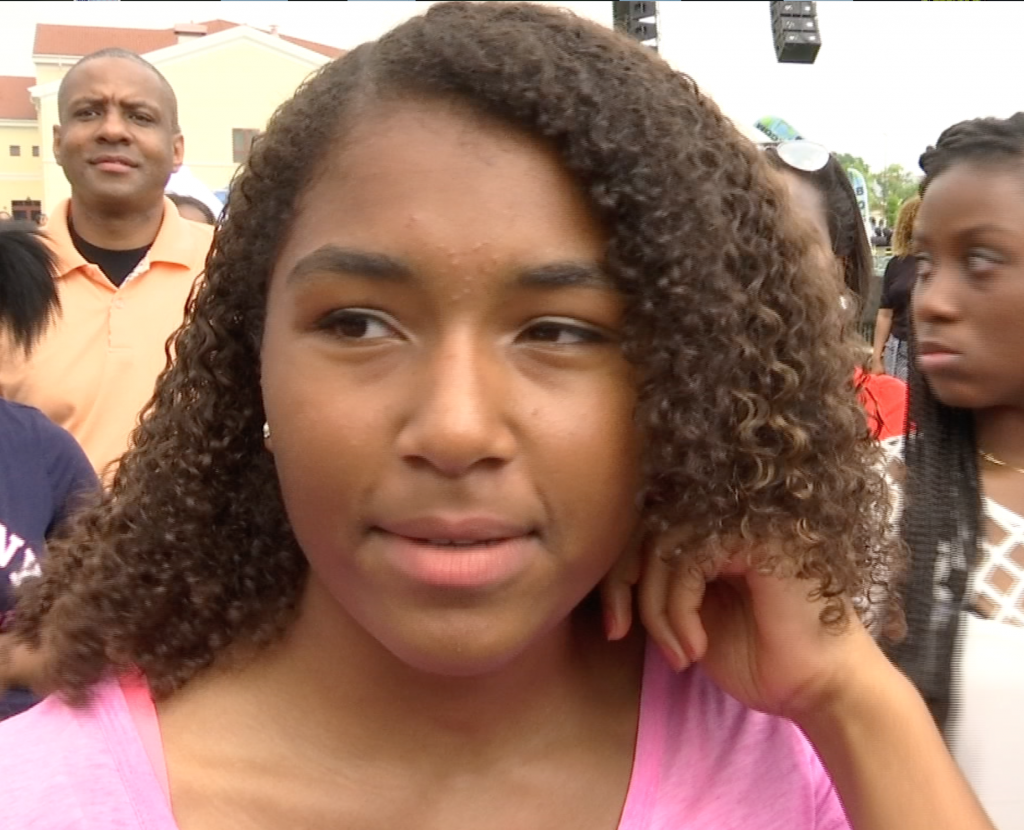 17-year-old Camilla Oetlah who described the First Lady as "awesome".  June 19, 2015. Freeze frame of video shot by AP Television Cameraman Gigi Navarra