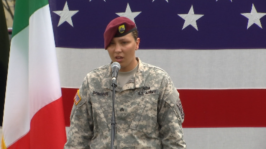 Soldier-singer Amanda Donohue singing "The Star Spangled Banner" prior to the arrival of First Lady Michelle Obama at Vicenza Army Garrison. June 19, 2015. Freeze frame of video shot by AP Television Cameraman Gigi Navarra