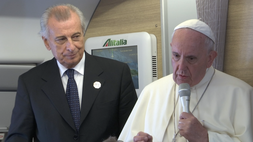 Pope Francis speaks to reporters aboard the Papal Plane enroute Washington. September 22, 2015. Freeze frame of video shot by AP video-journalist Paolo Santalucia.