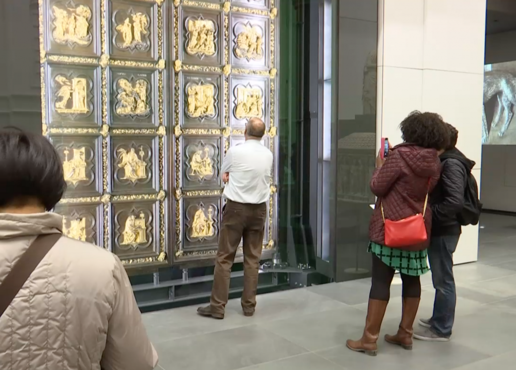 Tourists checking out the newly restored North Doors by Lorenzo Ghiberti inside the Museo dell'Opera del Duomo in Florence. Freeze frame of video shot by AP Television Cameraman Gigi Navarra. November 20, 2015