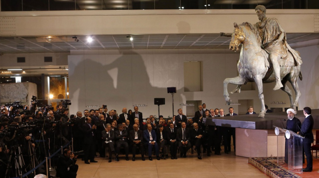 Italian Prime Minister Matteo Renzi and Iranian President Hassan Rohani speak in front of the Equestrian Statue of Marcus Aurelius at the Capitoline Museum in Rome.  January 25, 2016