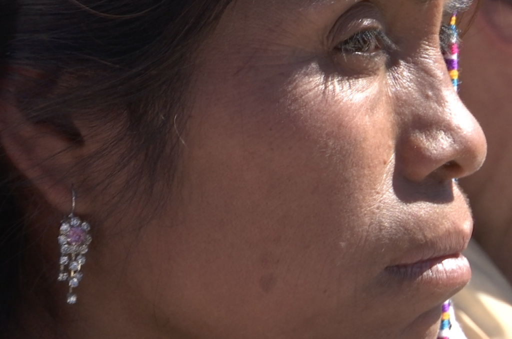 A woman in Chiapas listening to Pope Francis. Freeze frame of video shot by AP Television VJ Paolo Santalucia. February 15, 2016