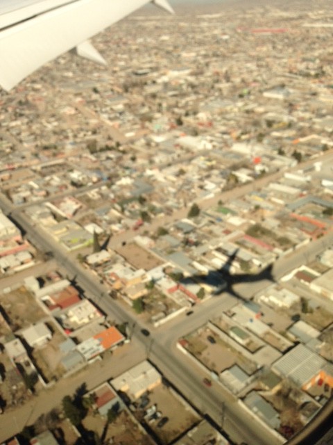 The shadow of the plane carrying Pope Francis as it lands in Cuidad Juarez February 17, 2015. Photo by Trisha Thomas
