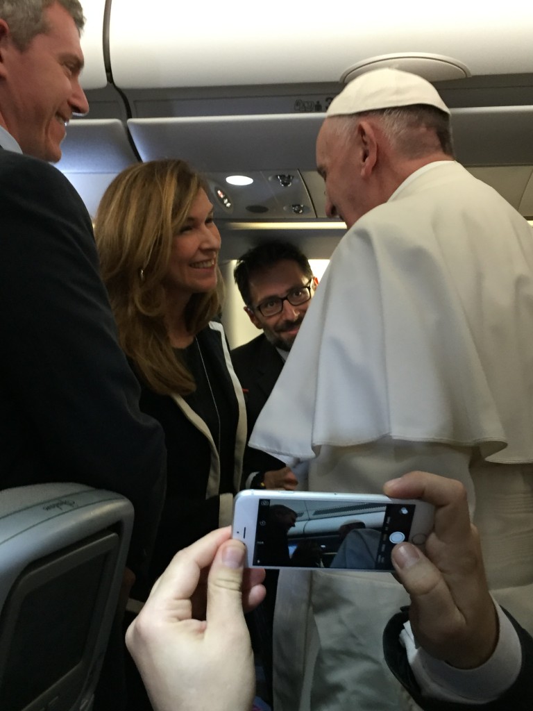 AP Television Team of Trisha Thomas and Paolo Santalucia meet Pope Francis on the Papal Plane heading for Mexico. February 12, 2016. Photo by Cindy Wooden of Catholic News Service