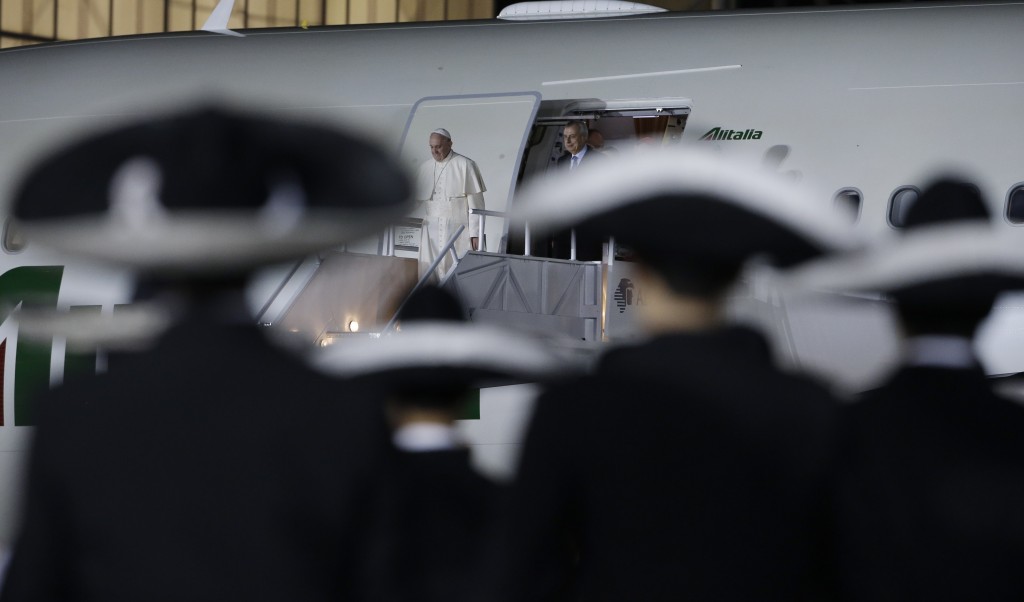 Pope Francis steps off airplane in Mexico City. February 12, 2016. Photo by AP Photographer Gregorio Borgia (for Mozzarella Mamma)