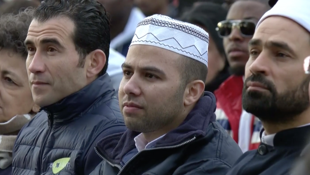 Muslim man in migrant center near Rome listening to Pope Francis give homily during Holy Thursday foot washing Mass. March 24, 2016. Freeze frame of video shot by Vatican TV