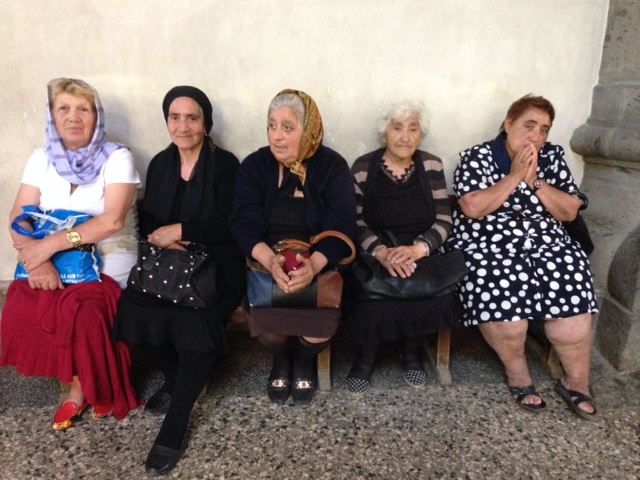 A group of Armenian women wait patiently for Pope Francis on a bench in the Seven Wounds Cathedral in Gyumri, Armenia. June 25, 2016. Photo by Trisha Thomas