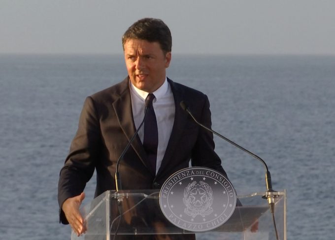 Italian Prime Minister Matteo Renzi speaking to the press aboard the Italian aircraft carrier Garibaldi. August 22, 2016. Freeze frame of video shot by AP Television Cameraman Gianfranco Stara