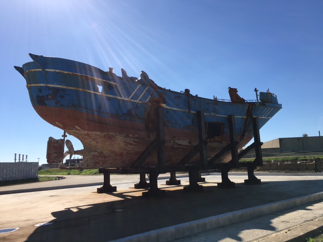 Shipwreck stands empty at the Melilli Naval Base in Melilli, Sicily. Photo by Trisha Thomas, October 8, 2016 