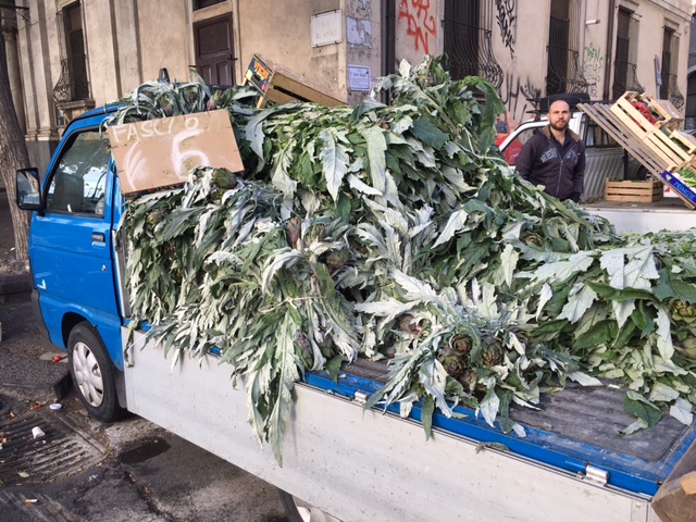 A "fascio" or bundle of something green on sale on the street in Catania. November 12, 2016. Photo by Trisha Thomas