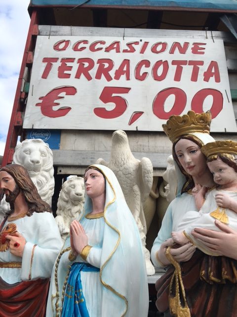 Madonna statuettes on sale for 5 euro on the street in Catania. Photo by Trisha Thomas, November 12, 2016