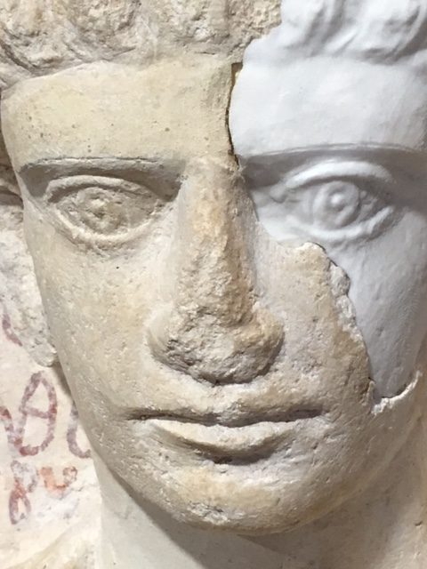 A male funerary bust from Palmyra, Syria, badly damaged by Islamic State Militants, is now being restored in Rome. Photo by Trisha Thomas, February 16, 2017