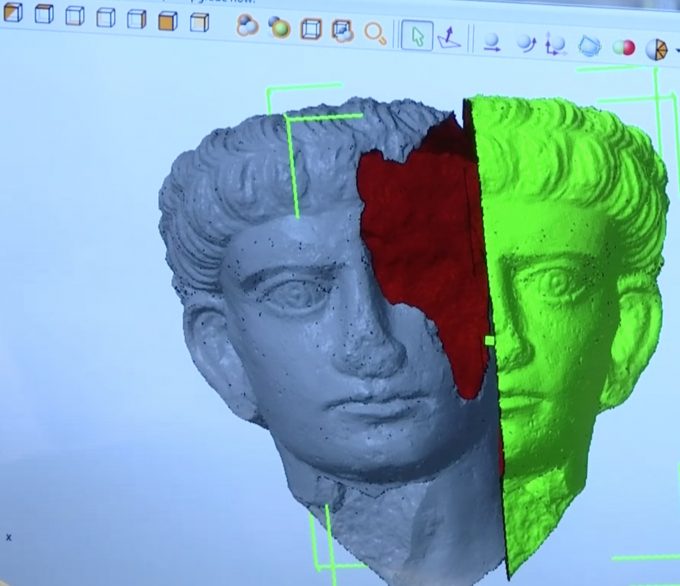 A computer rendering used by restorers to help replicate the destroyed half of a face on a male funerary statue from Palmyra. Freeze frame of video shot by AP Television cameraman Gianfranco Stara. February 16, 2017