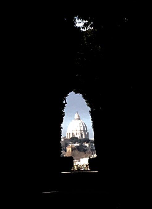 The view of St. Peter's Basilica through the keyhole of the gate to the Villa Magistral, Seat of the Sovereign Order of Malta on the Aventine Hill in Rome. Photo by Trisha Thomas, January 2017