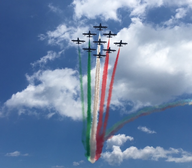 The Italian Air Force acrobatic team, known as the "Frecce Tricolori" - the three colored arrows - performs for the leaders of the G7 Summit in the skies above Taormina. Photo by Trisha Thomas. May 26, 2017 