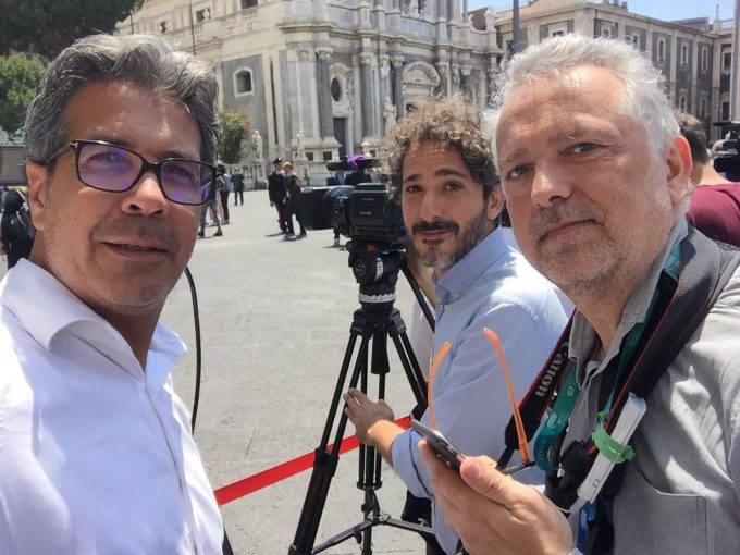 AP Television Camera Crew Gino Maceli and Fabio Platania with AP Rome Chief Photographer Domenico Stinellis waiting for the G7 Spouses in Catania, Sicily. May 26, 2017