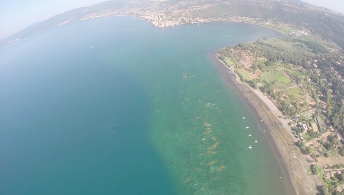 Aerial shot showing receding shores along Lake Bracciano as water continues to be siphoned off for the city of Rome. July 24, 2017. Credit: Chris Warde-Jones