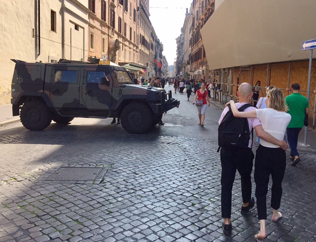 An Italian military jeep at one end of Rome's Via del Corso, Rome. October, 2017 